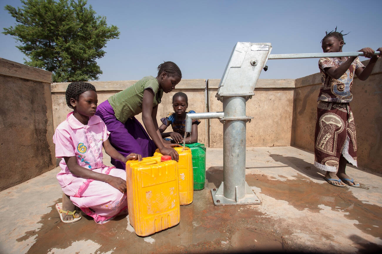 Drilling a well with a hand pump in the remote village of Saptanga in Burkina Faso